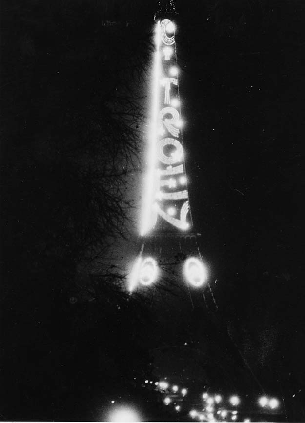 It would appear that in 1926, Citroen, the French automobile manufacturer, rented out space on the Eiffel Tower to advertise.