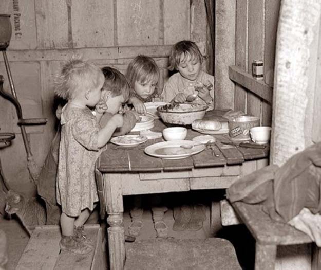 Children eating their Christmas dinner during the Great Depression: turnips and cabbage