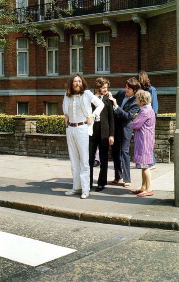 Beatles preparing to cross Abbey Road