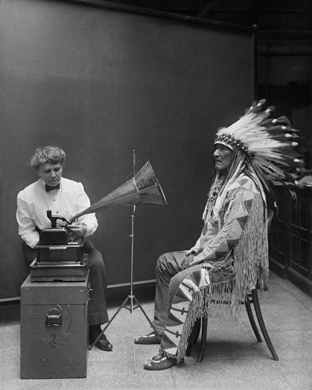 Ethnomusicologist Frances Densmore recording the music of a Blackfoot chief onto a phonograph, 1916