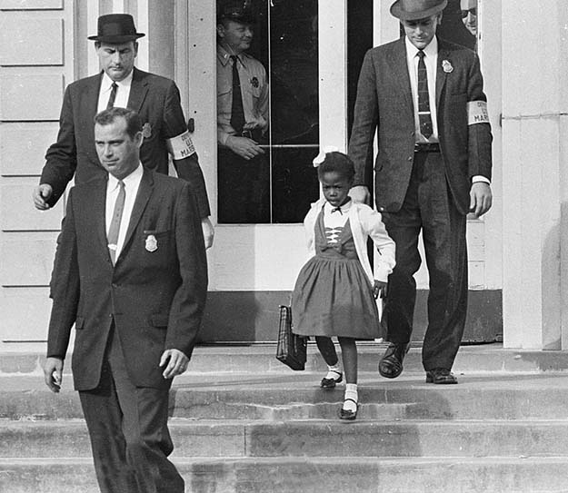 Ruby Bridges, first african-american to attend a white elementary school in the South (Nov. 14th, 1960)