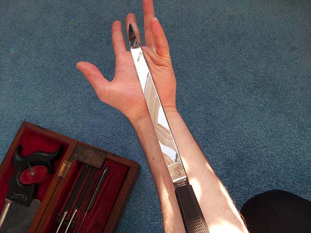 Largest of the knives is the length from my elbow to fingertip.