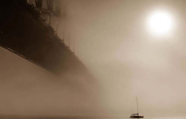  mist comes down and shrouds Sydney Harbour in Australia
