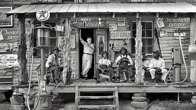 Country store on dirt road. Sunday afternoon. 1939