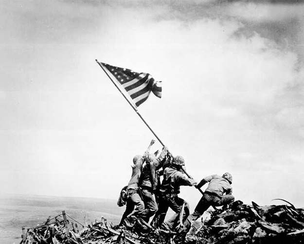 Raising the Flag on Iwo Jima, 1945 Read more at http://all-that-is-interesting.com/the-ten-most-iconic-photos-of-the-1940s/3/#pMPHCr4RAvexTf5x.99