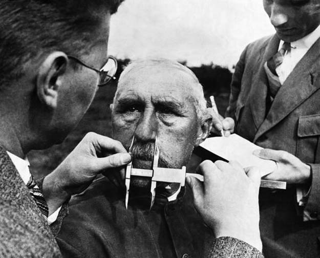 A man having his nose measured during Aryan race determination tests, 1940