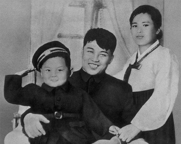 Kim Jong Il with his mother and father