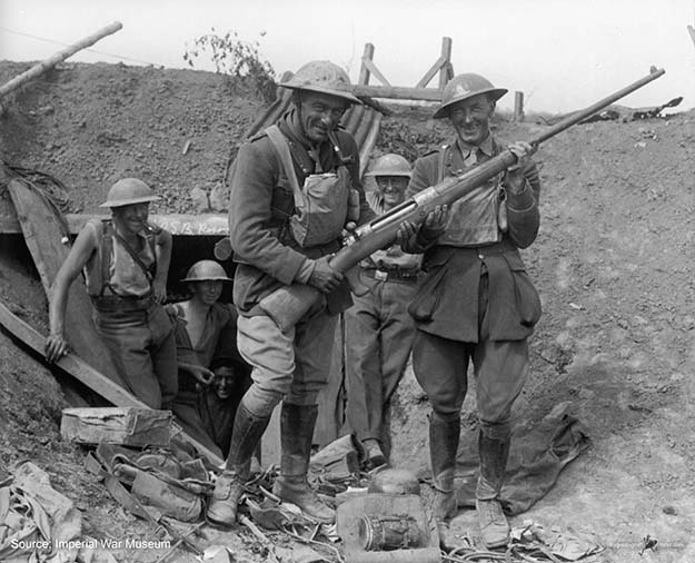New Zealand soldiers pose with a captured German Mauser T-Gewehr anti-tank rifle near Grevillers, 1918