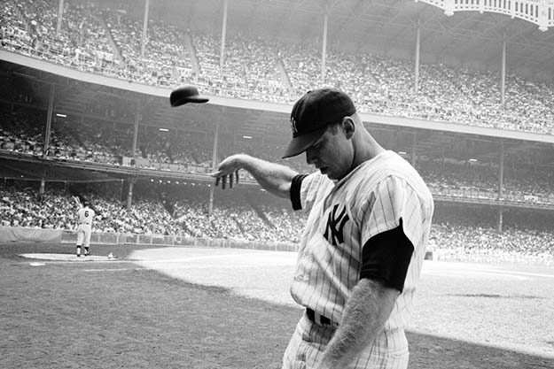Mickey Mantle flings his batting helmet in disgust after a lousy at-bat, Yankee Stadium, 1965