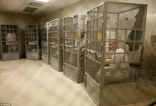 Caged therapy: Administrative segregation prisoners take part in a group therapy session at San Quentin