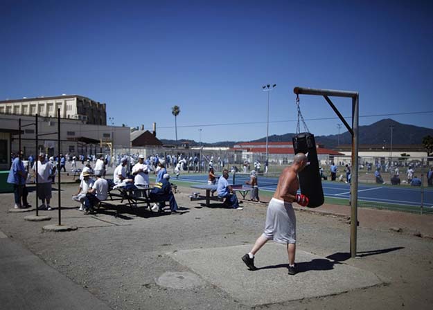 Chris Willis, 34, works out in the exercise yard at San Quentin state prison on June 8, 2012.