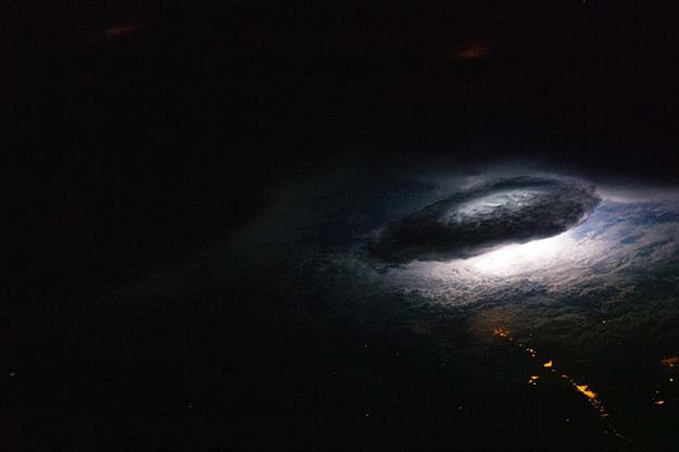 This is what a nighttime thunderstorm looks like from space