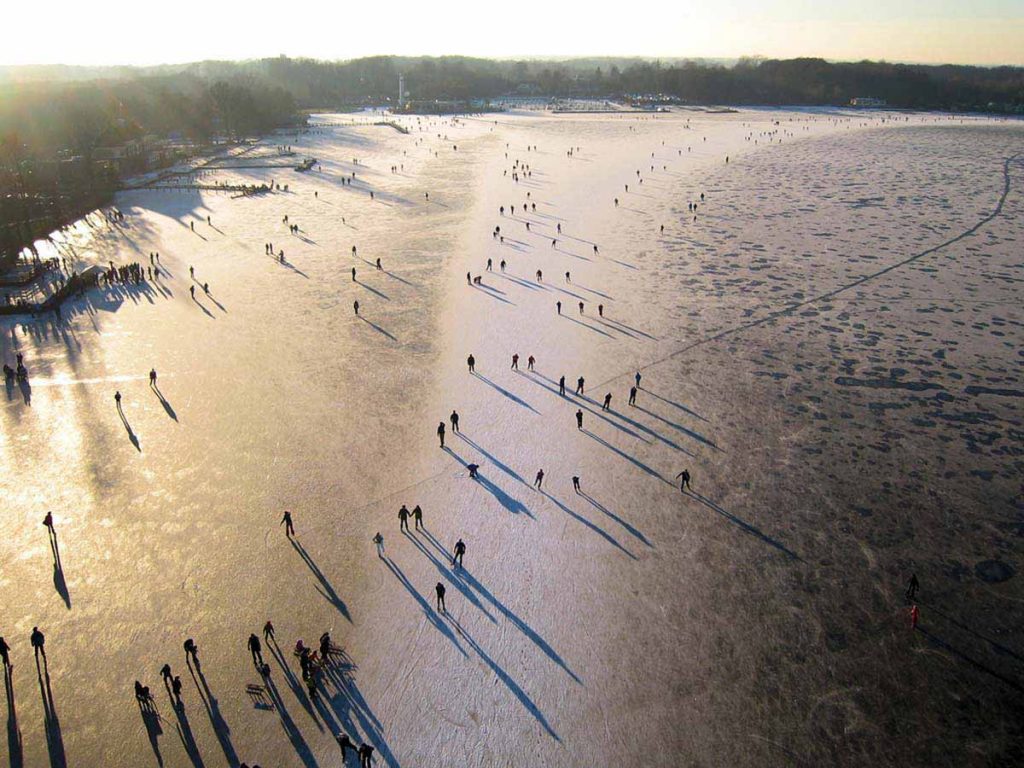 Ice skating on Paterswoldse Meer, a lake just South of the city of Groningen in the Netherlands.