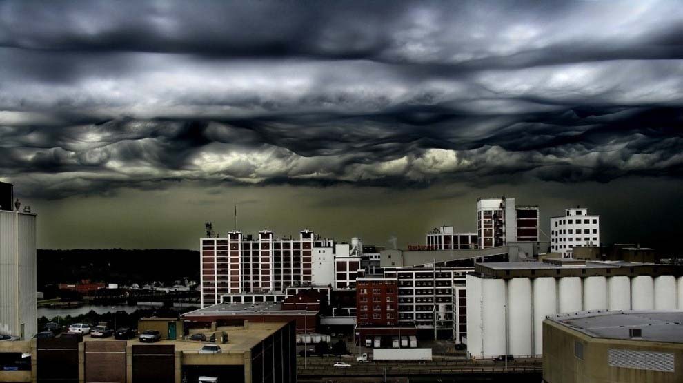 Terrifying storm clouds forming over a city
