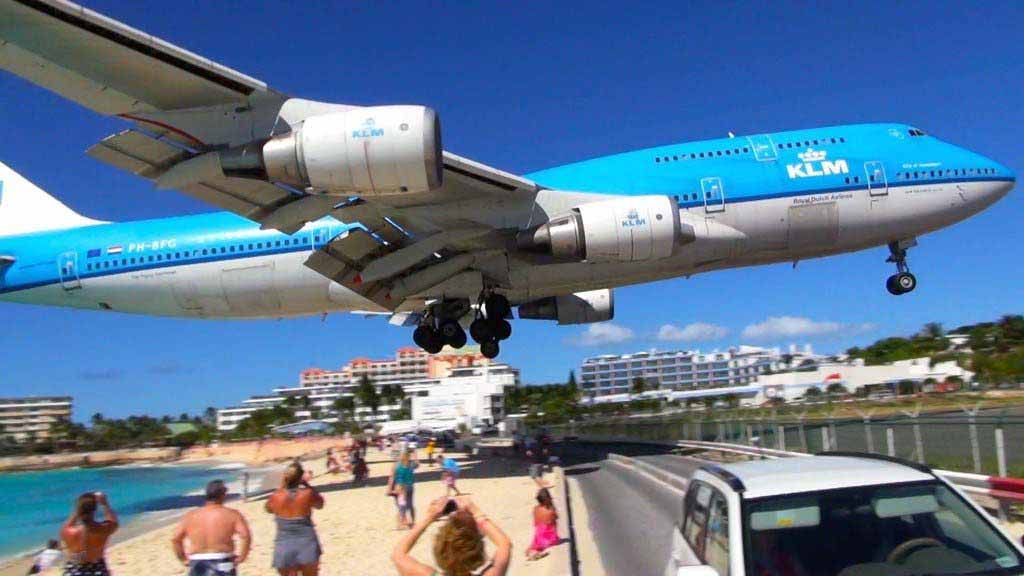 An airplane coming in for a landing at St. Maarten airport