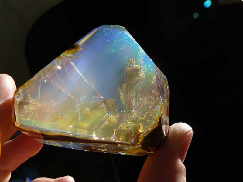 This is an ocean opal, which gives the illusion of a tiny ocean scene inside the stone