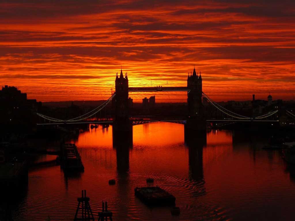 sunrise over london's tower bridge