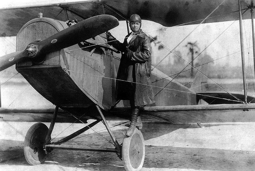 Aviator Bessie Coleman and her plane in 1922