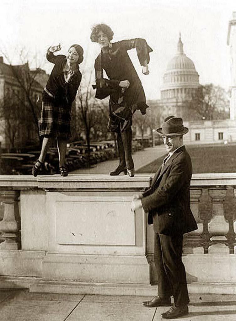 Dancing the Charleston on a railing in front of the US Capitol
