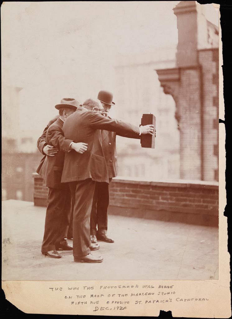 Group taking a selfie photo in 1920